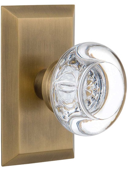 New York Rosette Door Set with Round Clear-Crystal Glass Knobs in Antique Brass.
